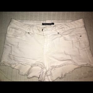 White fringe booty shorts